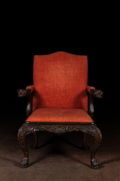 A richly decorated English Georgian style mahogany Gainsborough chair, ca. 1900