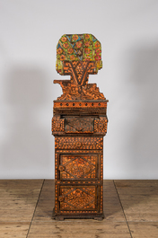 A North African fantasy cabinet with wooden and plastic parquetry, 20th C.
