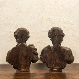 A pair of Italian walnut busts of males, 17th C.