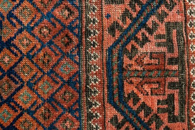 Three various Oriental rugs, wool on cotton, 20th C.