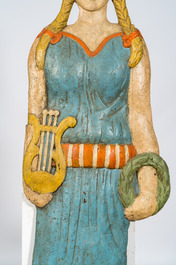 Two polychrome wooden reliefs of Erato holding her lyre and  of a young atlant, 19th C.