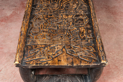 A Bamileke patinated wooden richly decorated bed, Cameroon, 20th C.