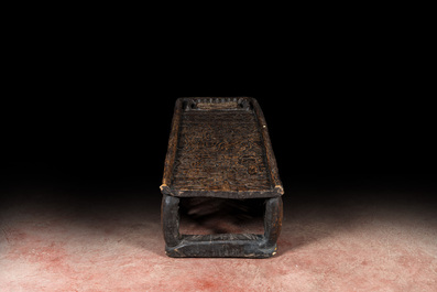 A Bamileke patinated wooden richly decorated bed, Cameroon, 20th C.