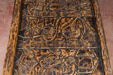 A Bamileke patinated wooden richly decorated bed, Cameroon, 20th C.