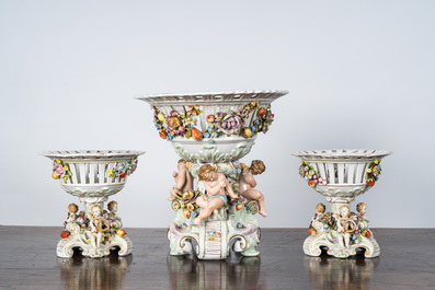 Three reticulated porcelain footed baskets with putti, Plaue Schierholz, Germany, early 20th C.