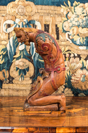 A polychrome wooden support in the shape of a kneeling soldier, 18/19th C.