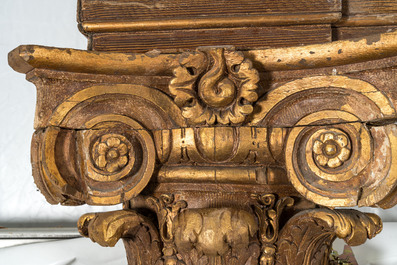 A partly gilt wooden portal with two columns with Ionic capitals, 18/19th C.