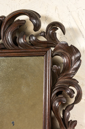 A baroque-style walnut mirror, 19th C.