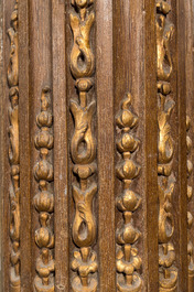 A partly gilt wooden portal with two columns with Ionic capitals, 18/19th C.