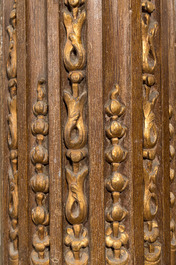 A partly gilt wooden portal with two columns with Ionic capitals, 18/19th C.