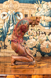 A polychrome wooden support in the shape of a kneeling soldier, 18/19th C.