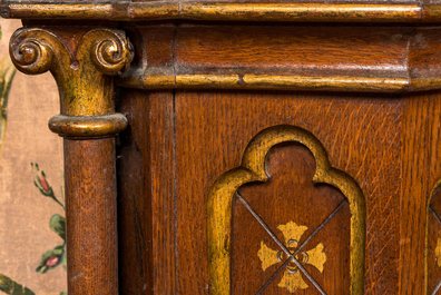 A pair of partly gilt wooden Gothic Revival stands, 19th C.