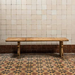 A rural wooden dining table and a bench, 19th C.