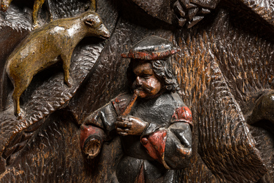 A pair of polychrome oak panels depicting shepherds guarding their flock, Flanders, 2nd half 16th C.