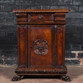 An Italian walnut one-door cupboard, 18th C.