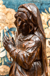 A walnut Virgin from a calvary, Southern Netherlands, 16th C.