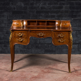 A mahogany and boxwood gilt bronze-mounted bureau, signed Fran&ccedil;ois Linke, France, late 19th C.