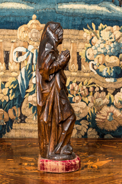 A walnut Virgin from a calvary, Southern Netherlands, 16th C.