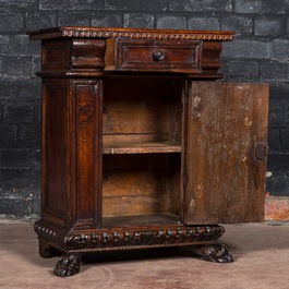 An Italian walnut one-door cupboard, 18th C.