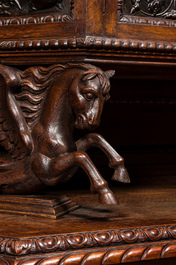 A carved oak buffet with stamped copper panels, 19/20th C.