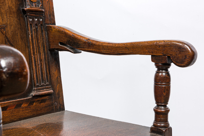 An inlaid carved oak chair with a Star of David, 17th C.