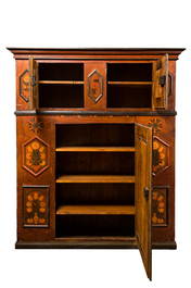 A Hungarian polychrome wooden three-door cupboard with floral design, 19th C.