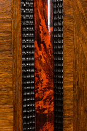 A Flemish wooden two-door cupboard with tortoiseshell and ebonised accents, 17th C. and later