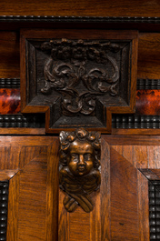 A Flemish wooden two-door cupboard with tortoiseshell and ebonised accents, 17th C. and later