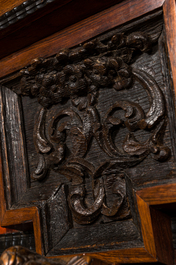 A Flemish wooden two-door cupboard with tortoiseshell and ebonised accents, 17th C. and later