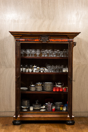 A Flemish wooden two-door cupboard with tortoiseshell and ebonised accents, 17th C. and later