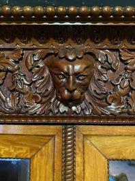 A Gothic Revival walnut and walnut veneered cabinet on foot with marble top, 19/20th C.