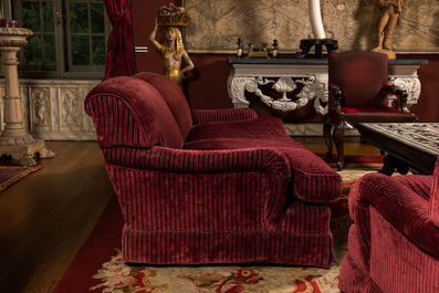 A pair of two-seaters with red velvet upholstery, 19/20th C.