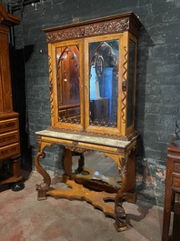 A Gothic Revival walnut and walnut veneered cabinet on foot with marble top, 19/20th C.
