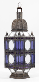 A pair of large Moroccan metal and glass lanterns, mid 20th C.