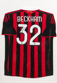 A framed and A.C. Milan football jersey signed by David Beckham