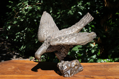 A patinated wood sculpture of an American eagle, 19/20th C.