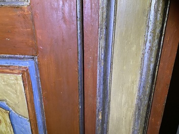 A pair of large Italian polychrome wooden two-door cupboards with coats of arms, 17th C.