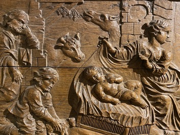 A large rectangular oak carving depicting 'The adoration of the shepherds', 18th C.