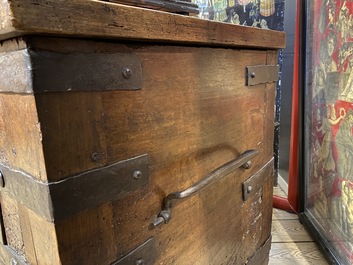 A wrought iron-mounted wooden coffer, 17th C.