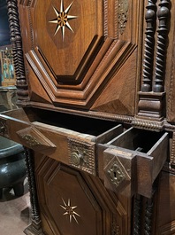 An imposing baroque-style parquetry oak four-door cupboard, 19th C.