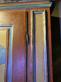 A pair of large Italian polychrome wooden two-door cupboards with coats of arms, 17th C.