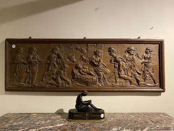 A large rectangular oak carving depicting 'The adoration of the shepherds', 18th C.