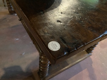 A Spanish walnut table with three drawers, 17th C