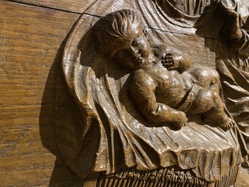 A large rectangular oak carving depicting 'The adoration of the shepherds', 18th C.