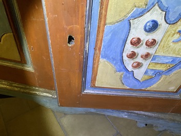 A pair of large Italian polychrome wooden two-door cupboards with coats of arms, 17th C.