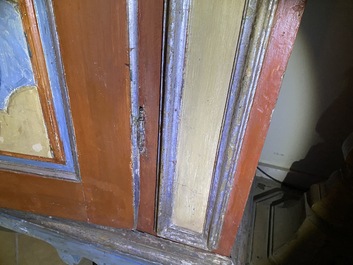 A pair of large Italian polychrome wooden two-door cupboards with coats of arms, 17th C.