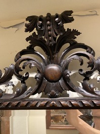 An ebonised walnut rococo-style mirror, probably Italy, 18/19th C.