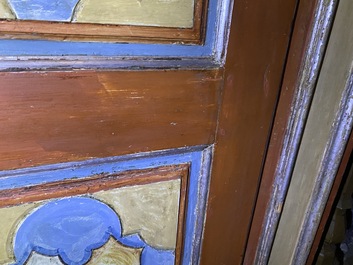 A pair of large Italian polychrome wooden two-door cupboards with coats of arms, 17th C.