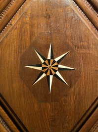 An imposing baroque-style parquetry oak four-door cupboard, 19th C.