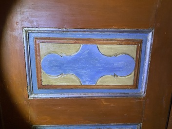 A pair of large Italian polychrome wooden two-door cupboards with coats of arms, 17th C.